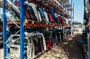 Racks of dismantled engines, gearboxes and parts at New Zealand Car Parts Auckland